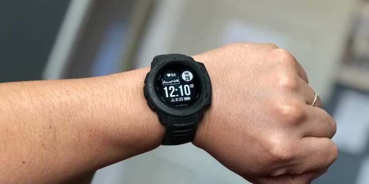 person wearing black digital watch