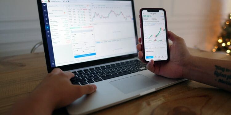 macbook pro on brown wooden table