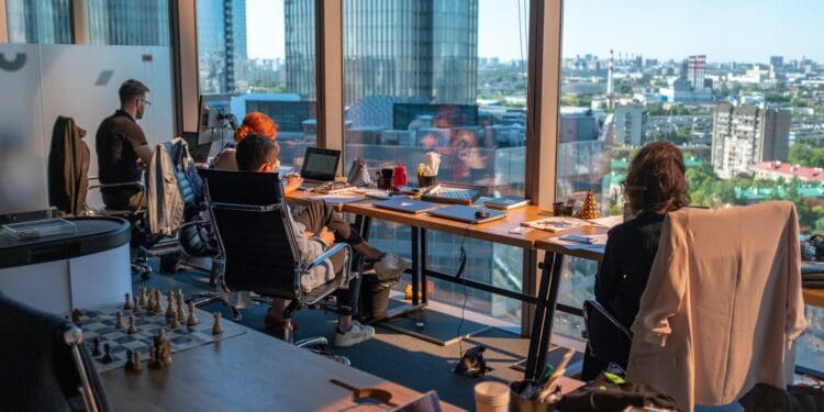 person sitting beside table