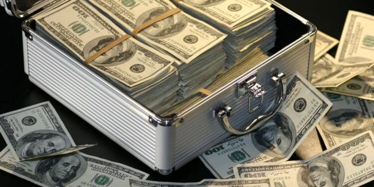 grey metal case of hundred dollar bills