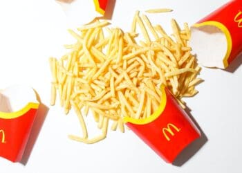 mcdonalds fries on white table