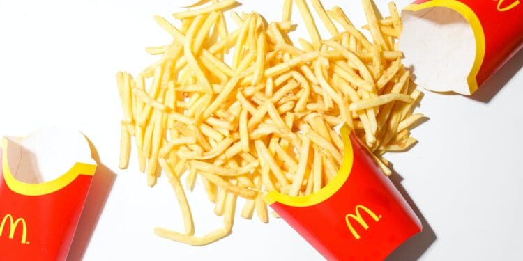 mcdonalds fries on white table