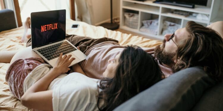 a couple lying in bed