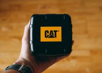 person holding black cat case