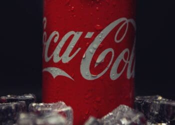 close up shot of red coca cola in can