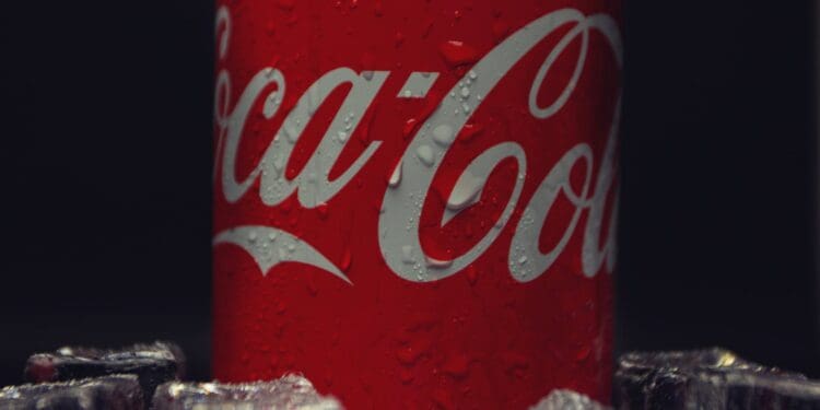 close up shot of red coca cola in can