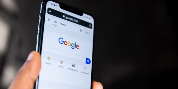 person holding black android smartphone