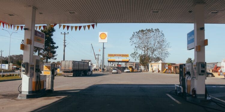 Empty gas station with oil petrol dispensers located on highway for serving long distance vehicles