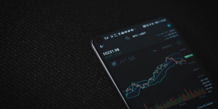 black android smartphone on black textile