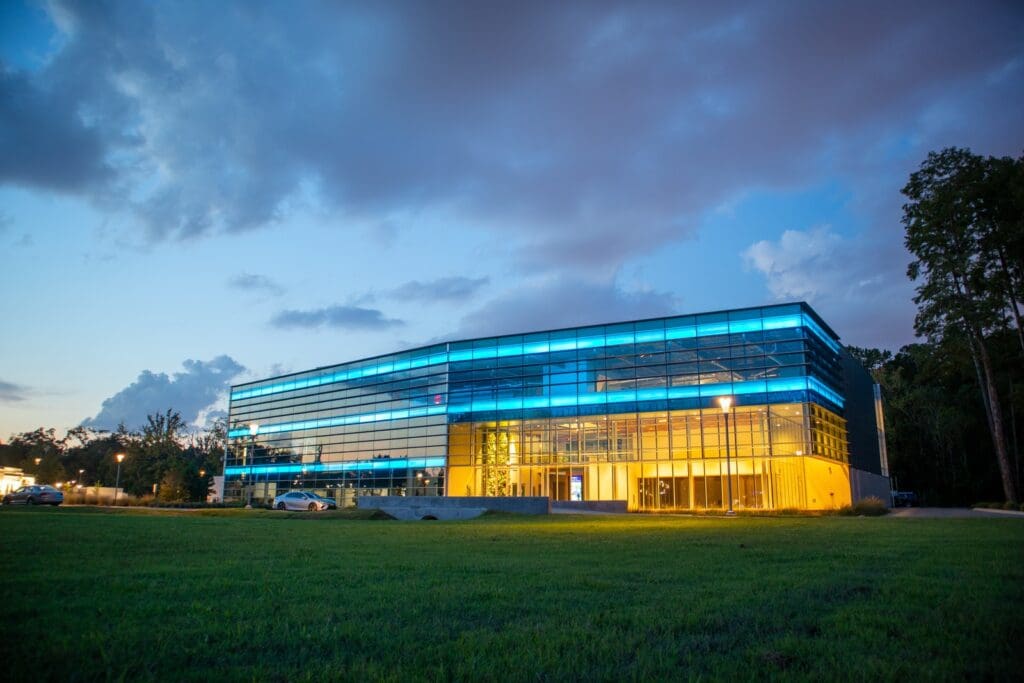white and blue building under cloudy sky during daytime