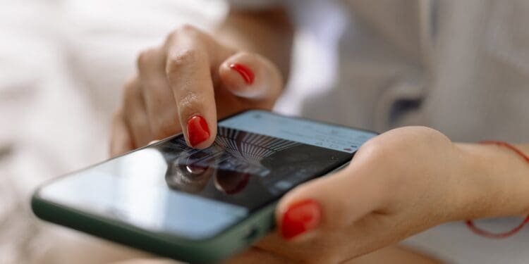 Person Holding Silver Iphone 6