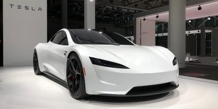 white lamborghini aventador parked in building