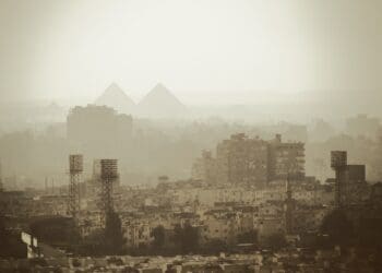 aerial photo of gray buildings near pyramids