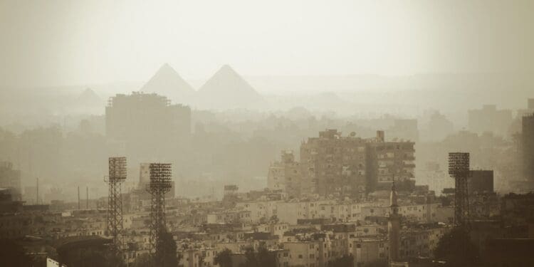 aerial photo of gray buildings near pyramids