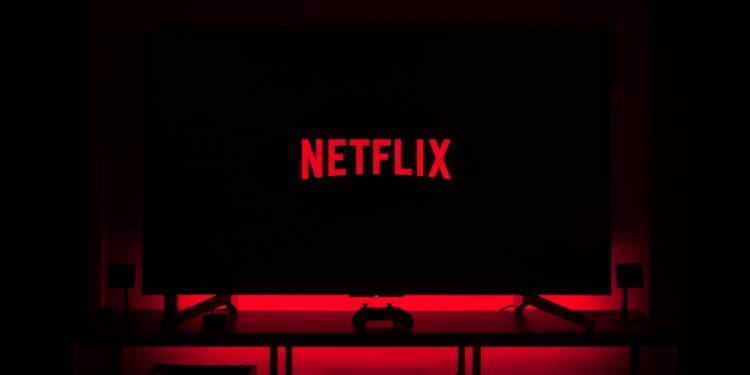 flat screen television displaying Netflix logo
