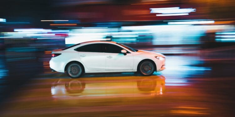 timelapse photography of white sedan