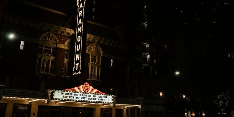 white and red chicago building during night time