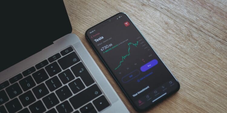 black android smartphone on macbook pro