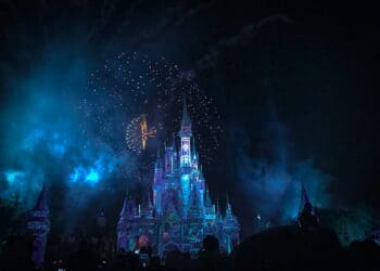 crystal castle with fireworks at night