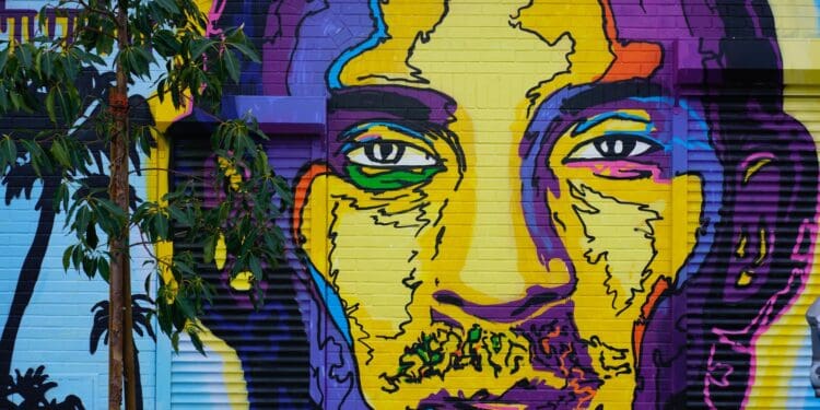 woman in yellow hair and black shirt graffiti