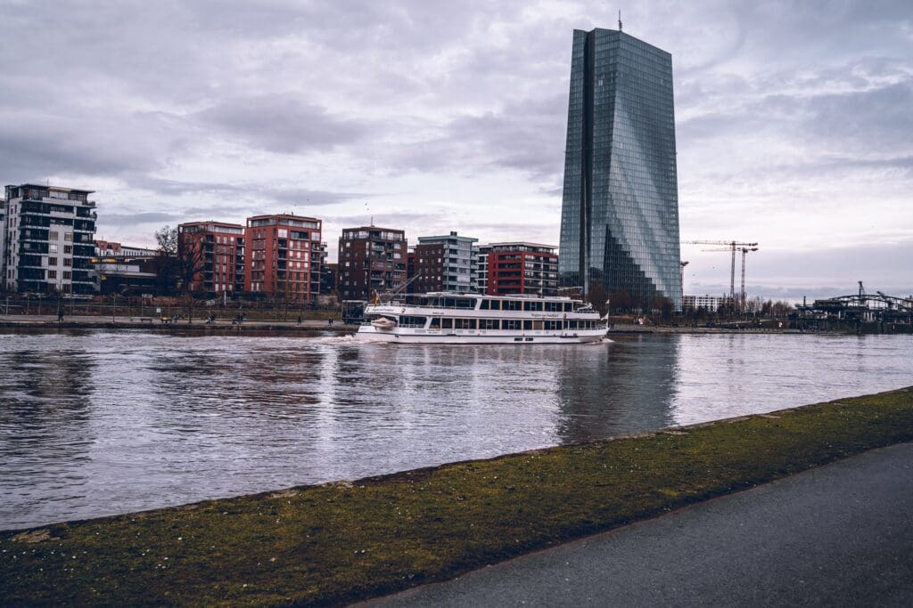 city skyline across body of water during daytime