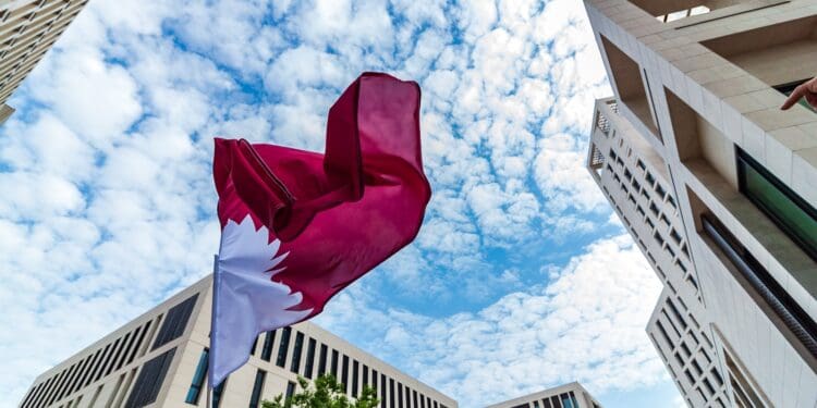 red and white flag between buildings
