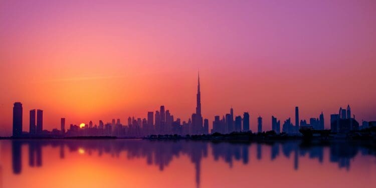 silhouette of city buildings during sunset