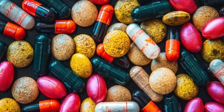 red and brown medication pill