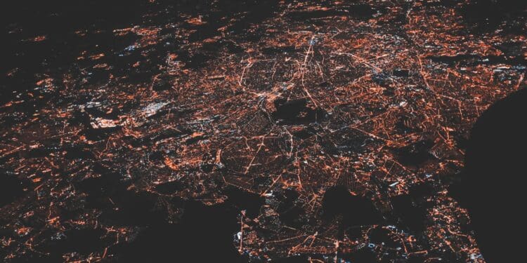 lighted city at night aerial photo