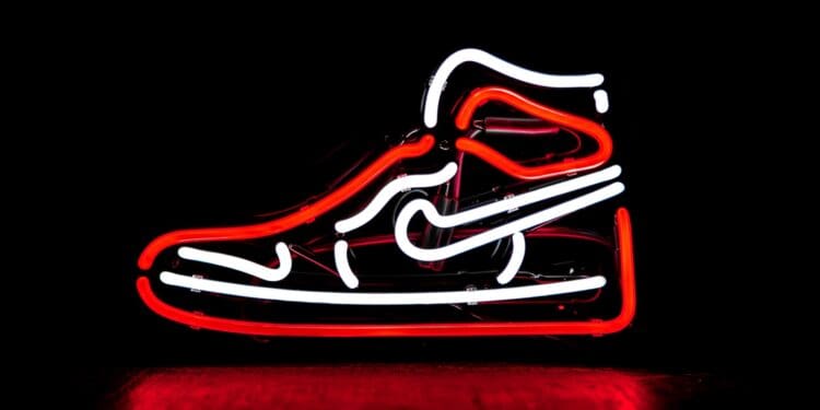 red and white Nike basketball shoe neon signage