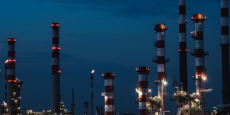 red and white tower under blue sky during night time