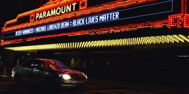 black porsche 911 parked on the street