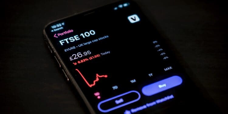 black android smartphone on brown wooden table