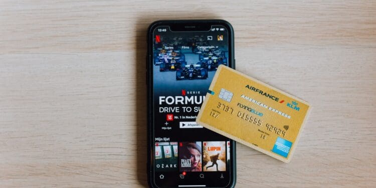 black samsung android smartphone on white wooden table