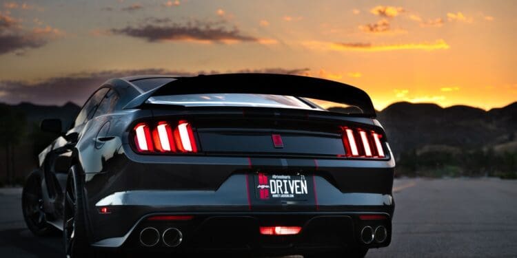 black bmw m 3 on road during sunset