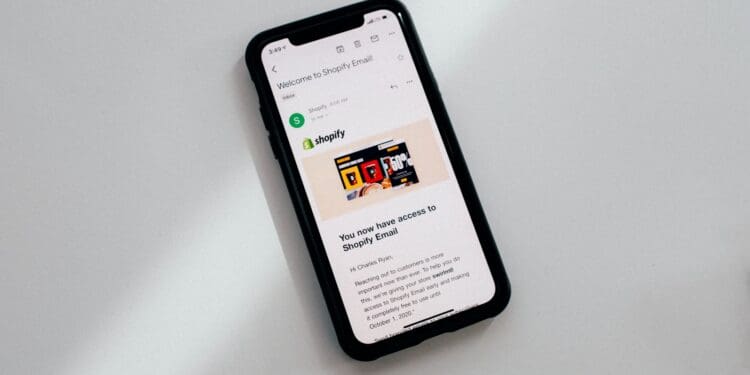 black iphone 5 on white table