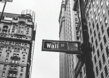 grayscale photo of 1-21 Wall street signage