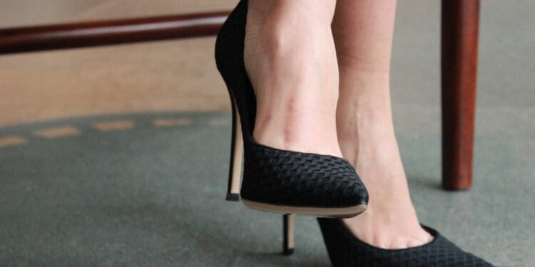 woman wearing black silettos
