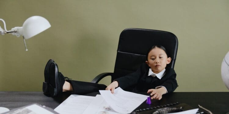 A Young Girl Sitting in the Office