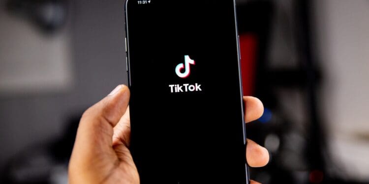 person holding black iphone 5