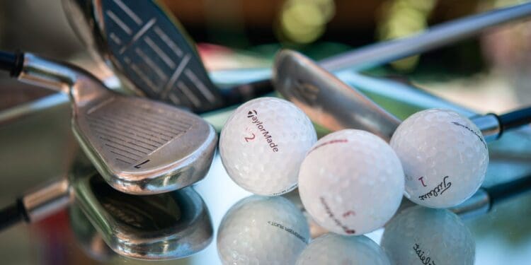 golf ball on green plastic container
