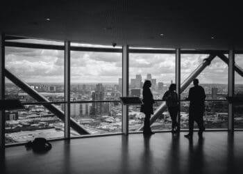 people standing inside city building