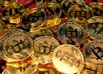 A pile of Bitcoin coins.