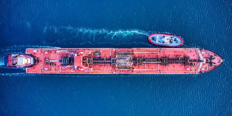 A red oil tanker shot from directly above.