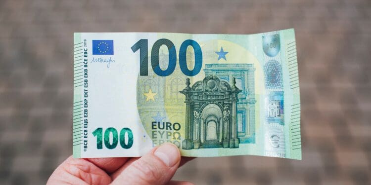 Cash 100 € EURO EUR banknote money with security features and watermark