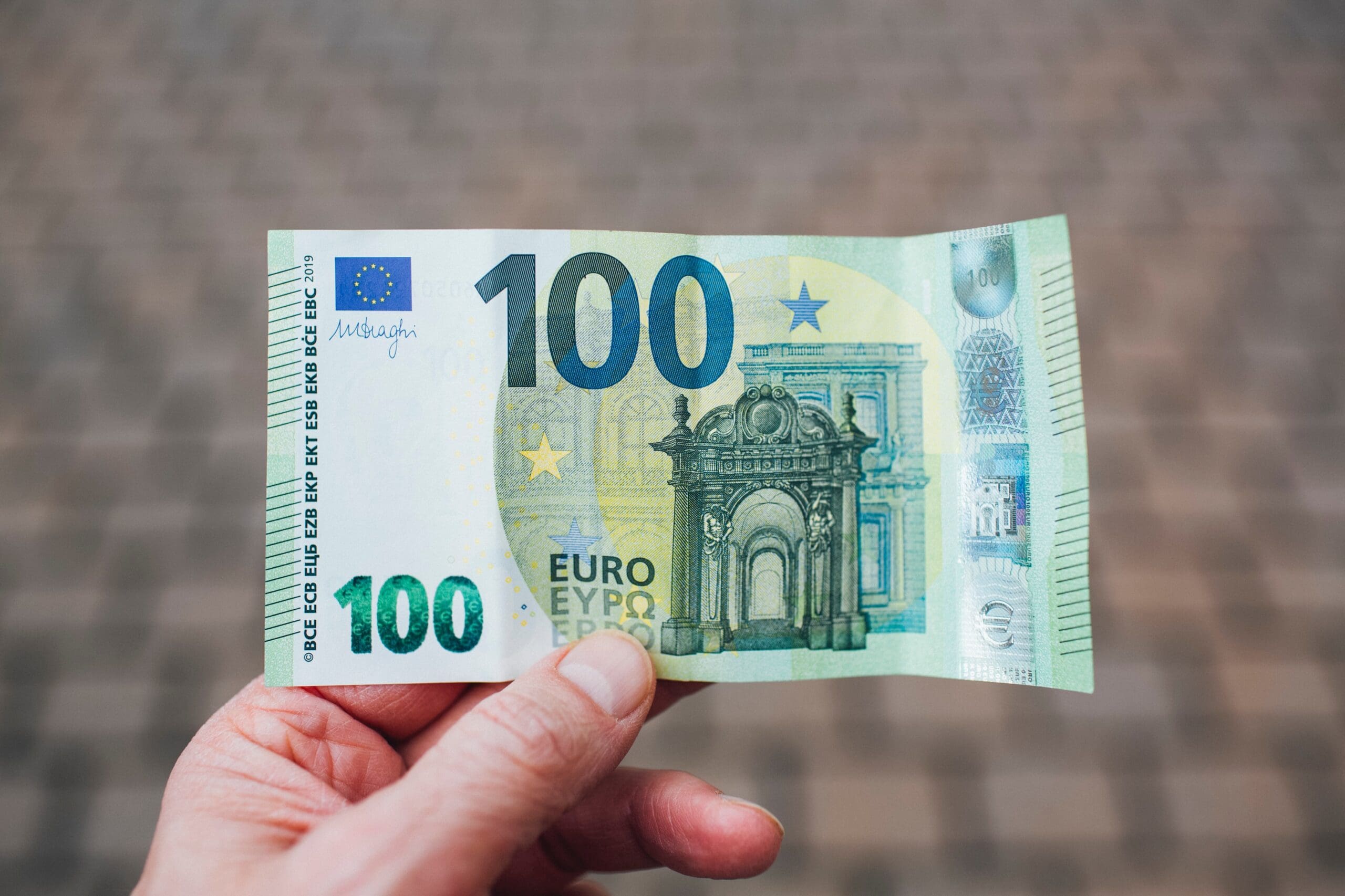 Cash 100 € EURO EUR banknote money with security features and watermark