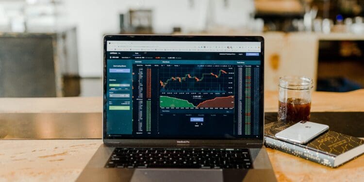 Daytrading bitcoins financial markets at a coffeeshop.".