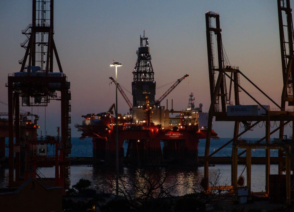 Dock with West Bollsta semi-submersible drilling rig (a vessel in the Oil service segment) on the Tenerife island during sunset.P.S. If you like my work and want to support me, there is an option to buy a coffee (paypal link in profile). Thank you!