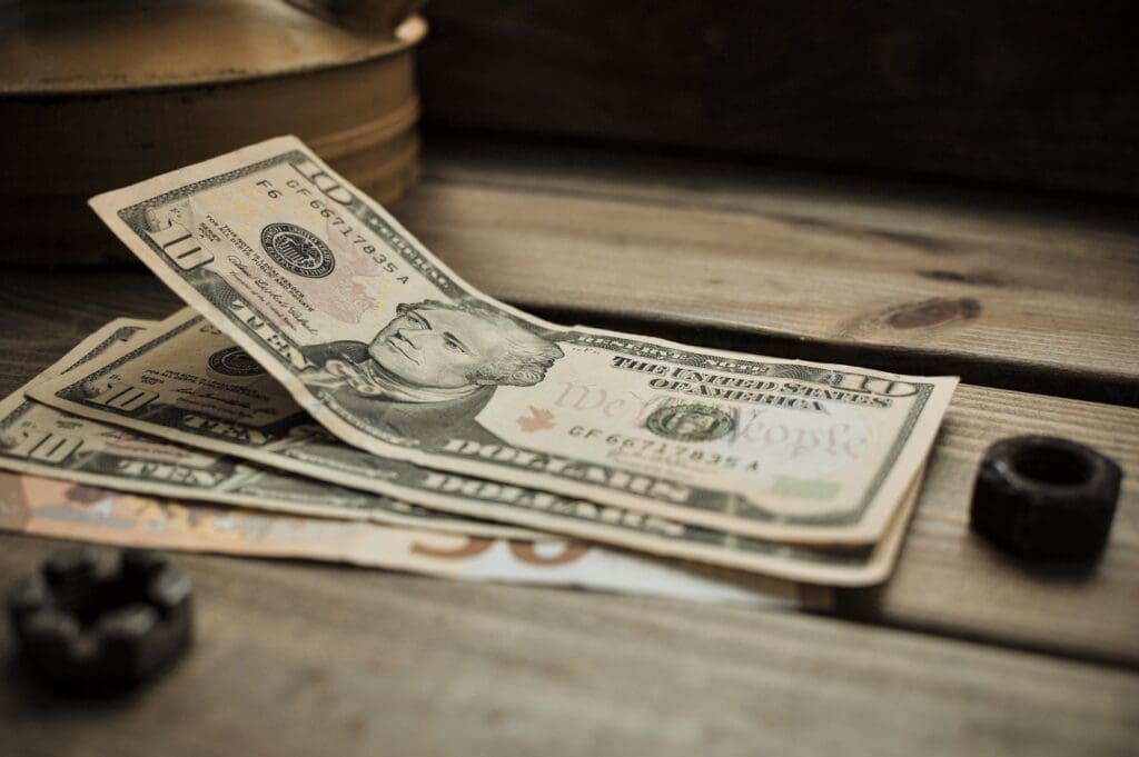 dollars on a wooden background