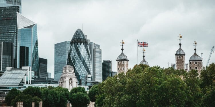 green trees near city buildings during daytime